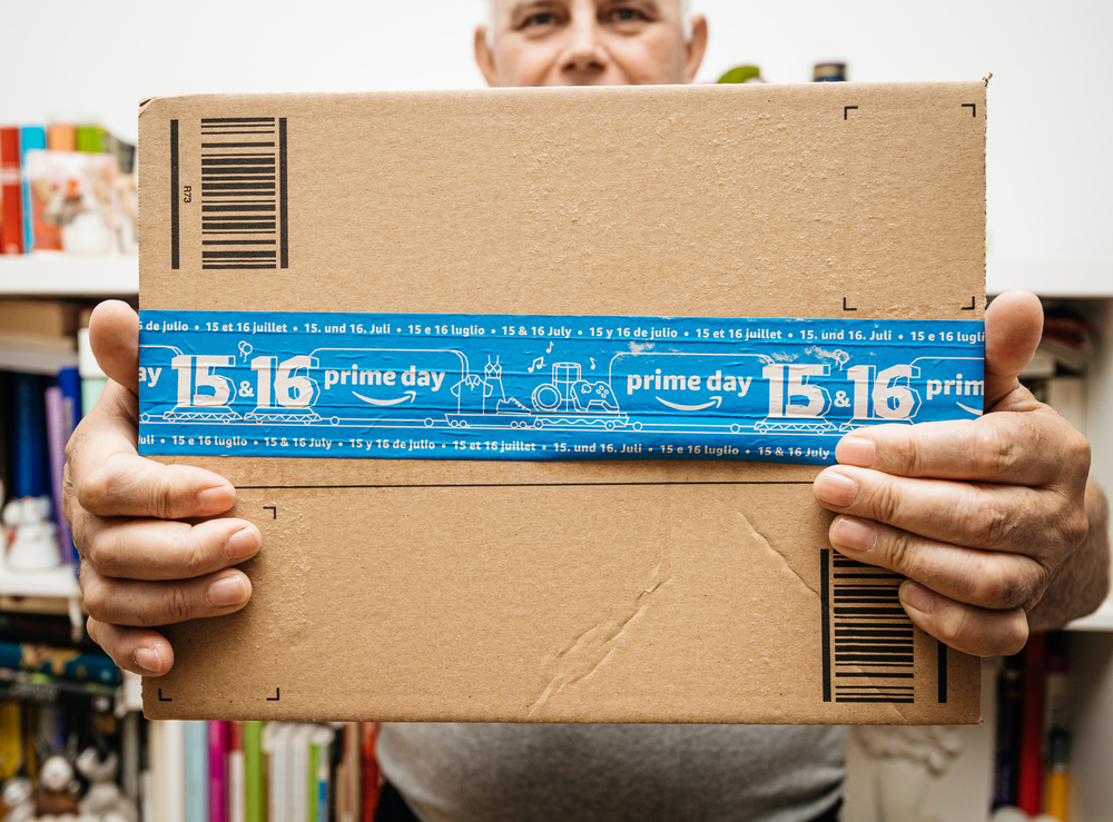 Man holding box with Amazon ASIN barcode